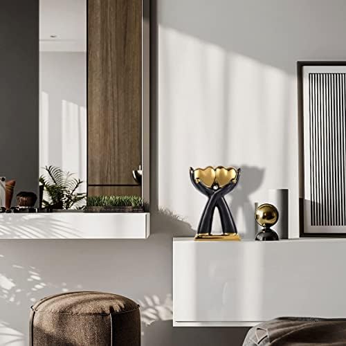 עיצוב הבית דוכן תקציר אמנות שחורה זהב קרמיקה קרמיקה פסל לב פסל, מבטאים עיצוב מודרניים שולחן מרכזי לחדר כניסה