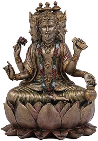 אברוס נפש קוסמית עליונה אלוהות הינדית ברהמה פסל ברהמן ארבע וודות פונות טריניטי בהיותו צלמית יושבת על כס המלכות