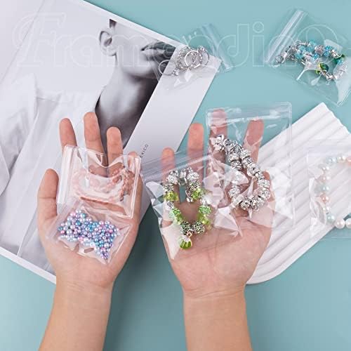 Framendino, 200 חבילות תכשיטים של חותם עצמי תיקים PVC תיקי אחסון תכשיטים תיקי תכשיטים ברורים מארגן תיק תכשיטים