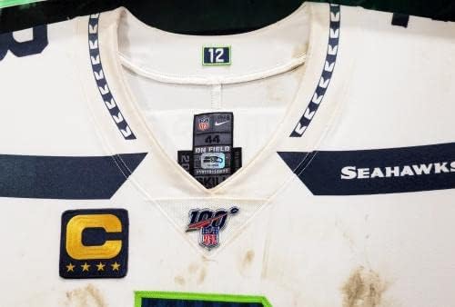 משחק ממוסגר של ראסל ווילסון השתמש בסיאטל סיהוקס ג'רזי נייקי לבן עם התיקון של קפטן & לוגו NFL 100 SKU לא